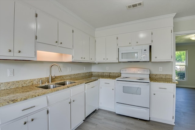 301 Cobblestone Ct, Martinez, GA 30907 - kitchen featuring white appliances, crown molding, light wood finished floors, white cabinets, and light stone counters