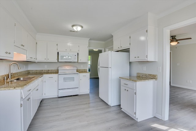 301 Cobblestone Ct, Martinez, GA 30907 - kitchen featuring white appliances, white cabinetry, light wood-style flooring, light stone countertops, and ornamental molding