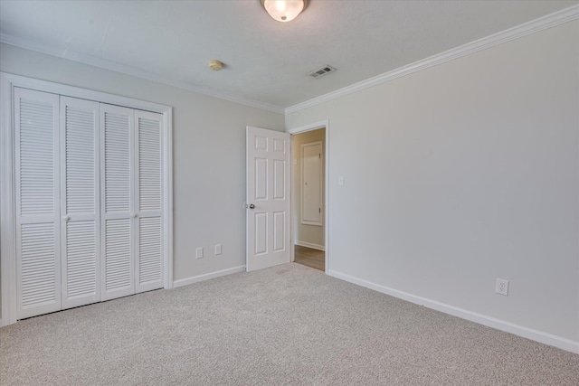 301 Cobblestone Ct, Martinez, GA 30907 - unfurnished bedroom with carpet floors, ornamental molding, and a closet
