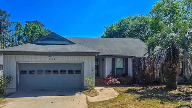 206 W Amelia Dr, Martinez, GA 30907 - single story home with an attached garage, roof with shingles, board and batten siding, and concrete driveway