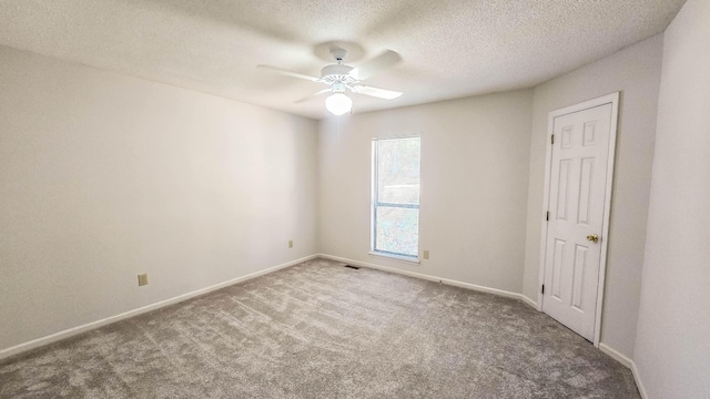 206 W Amelia Dr, Martinez, GA 30907 - unfurnished room with carpet floors, a textured ceiling, a ceiling fan, and baseboards