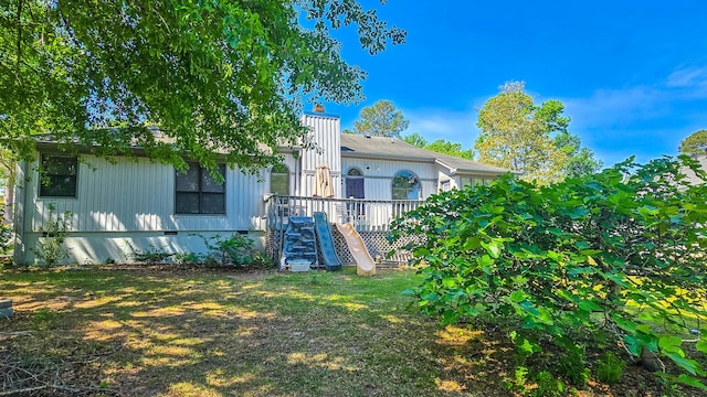 206 W Amelia Dr, Martinez, GA 30907 - rear view of property featuring a chimney, a wooden deck, and a yard