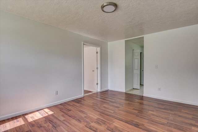 2028 Wharton Dr, Augusta, GA 30904 - spare room with wood finished floors and a textured ceiling