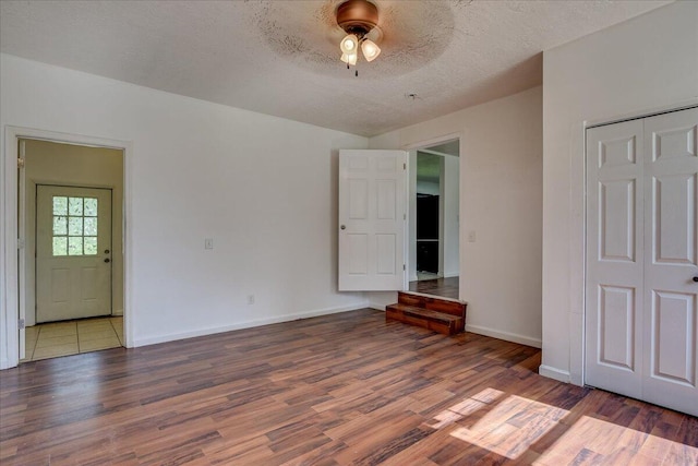2028 Wharton Dr, Augusta, GA 30904 - spare room featuring wood finished floors, a ceiling fan, and a textured ceiling