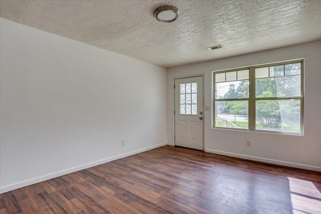 2028 Wharton Dr, Augusta, GA 30904 - empty room with dark wood-style floors and a textured ceiling