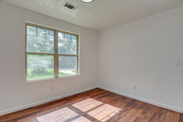 2028 Wharton Dr, Augusta, GA 30904 - spare room featuring wood finished floors and a textured ceiling