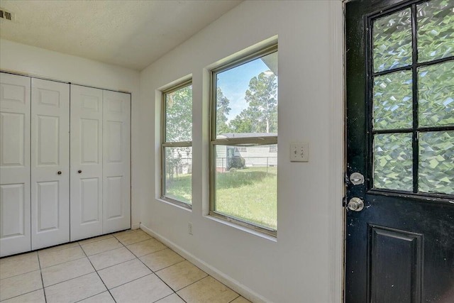2028 Wharton Dr, Augusta, GA 30904 - foyer featuring light tile patterned flooring and baseboards