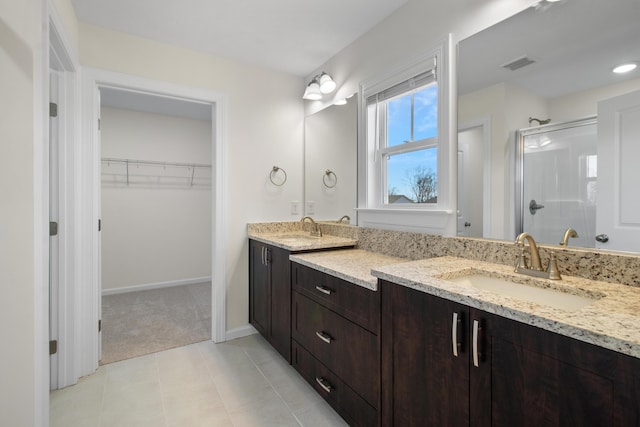 bathroom featuring vanity and walk in shower