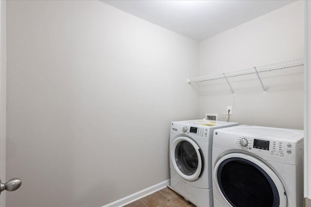 laundry room featuring tile patterned flooring and independent washer and dryer