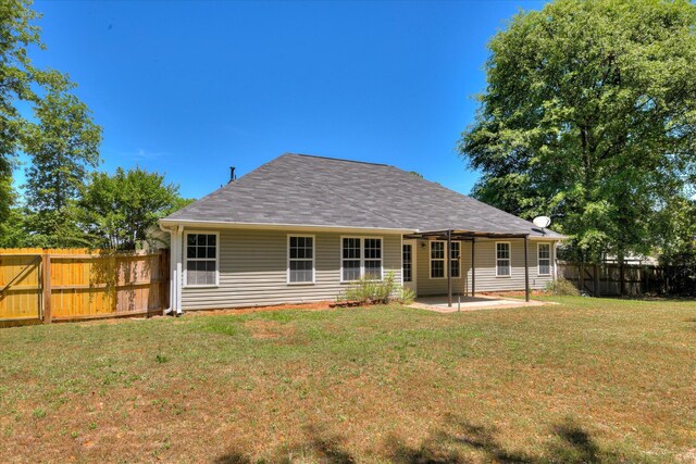 rear view of house with a patio area