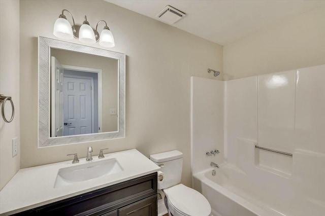 full bathroom with shower / bathing tub combination, vanity, and toilet