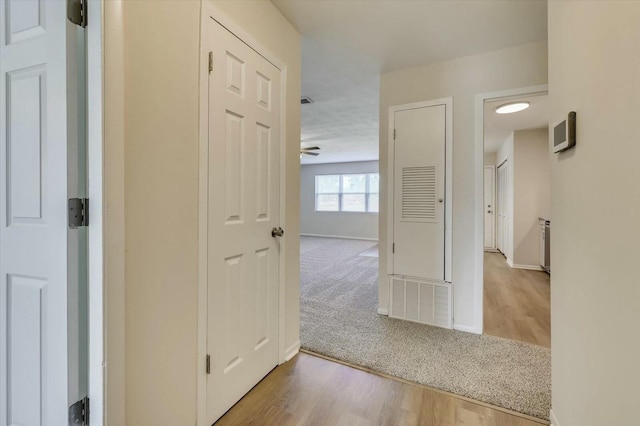 corridor featuring light wood-type flooring