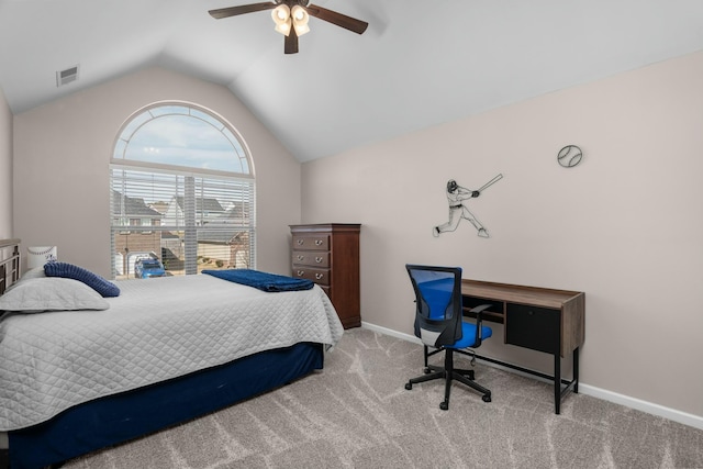 carpeted bedroom with visible vents, vaulted ceiling, baseboards, and ceiling fan