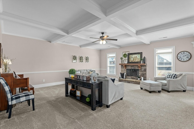 living area featuring carpet, a fireplace, beamed ceiling, and baseboards