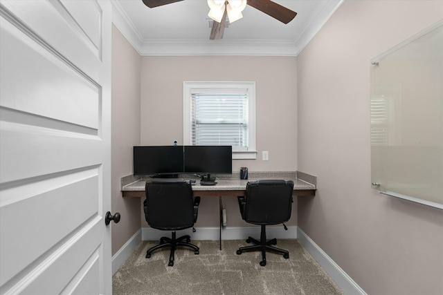 office area with baseboards, ornamental molding, ceiling fan, and carpet flooring