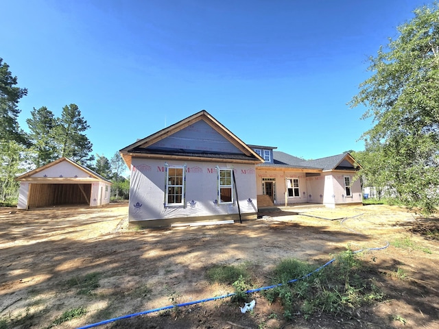 1189 Bellingham Dr, Beech Island, SC 29842 - rear view of property featuring an outdoor structure and a detached garage