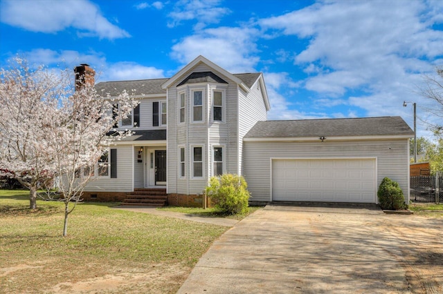 view of front facade with a garage, driveway, a front yard, crawl space, and a chimney