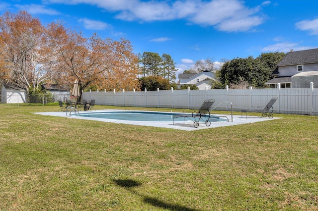 view of swimming pool with a fenced backyard, a patio area, a fenced in pool, and a yard