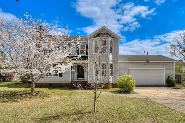 view of front of property with crawl space, a front yard, concrete driveway, and an attached garage