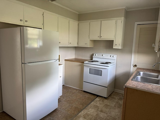 kitchen featuring white cabinets, crown molding, a sink, and white appliances