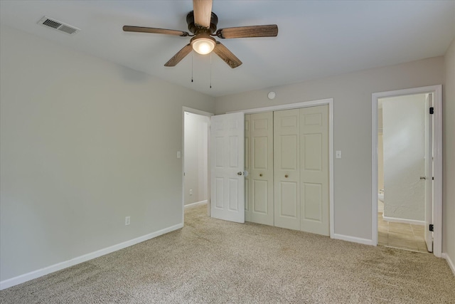 216 Dry Creek Rd, Evans, GA 30809 - unfurnished bedroom with carpet floors, a closet, baseboards, and a ceiling fan