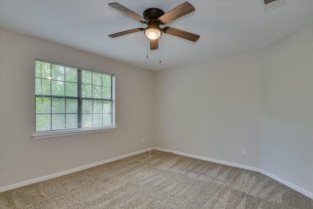 216 Dry Creek Rd, Evans, GA 30809 - empty room with light carpet, a ceiling fan, and baseboards