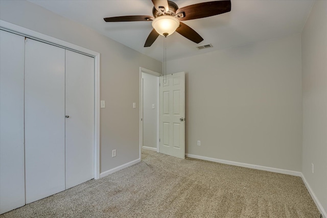 216 Dry Creek Rd, Evans, GA 30809 - unfurnished bedroom featuring carpet, baseboards, a closet, and ceiling fan