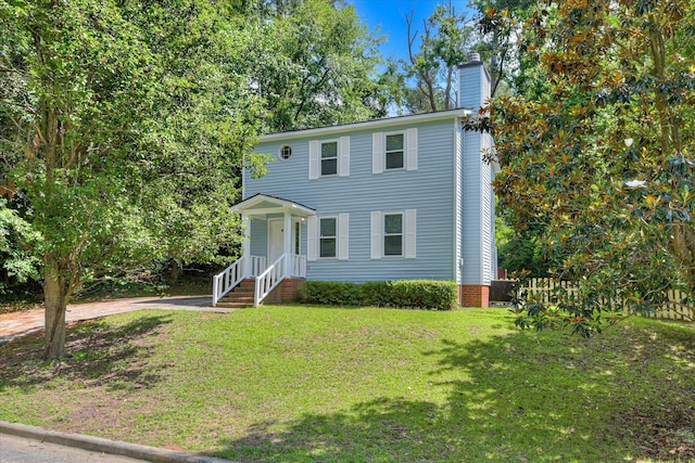 216 Dry Creek Rd, Evans, GA 30809 - view of front of house with a chimney, a front lawn, and driveway
