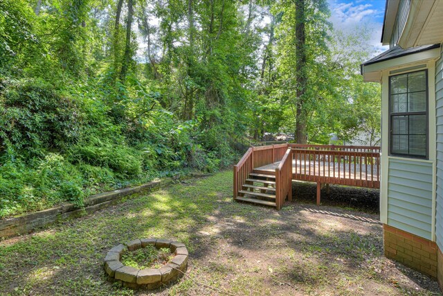 216 Dry Creek Rd, Evans, GA 30809 - view of yard featuring a deck, a fire pit, and stairs