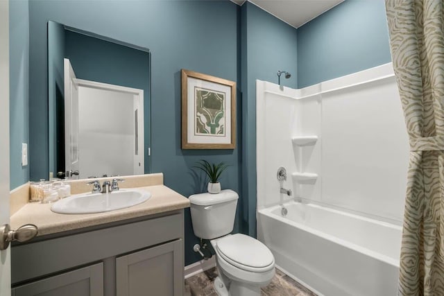 full bathroom featuring toilet, shower / washtub combination, vanity, and hardwood / wood-style flooring