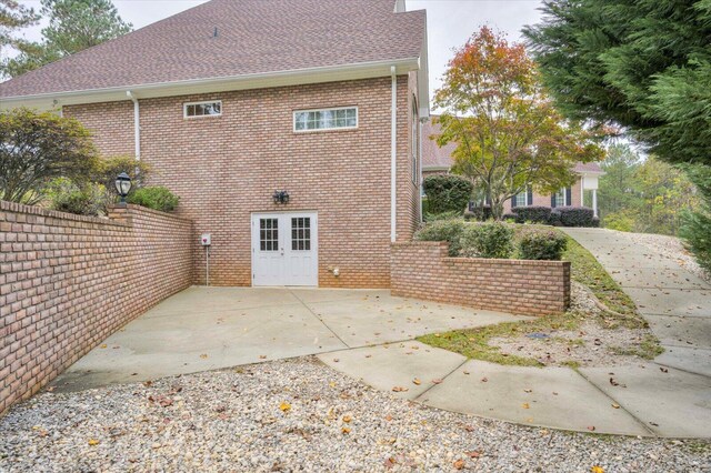 back of house with a patio area