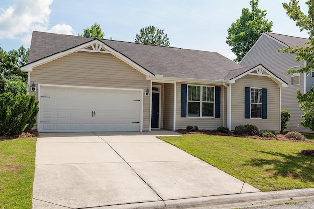 514 Cranberry Cir, Grovetown, GA 30813 - view of front of home with a garage, driveway, a front lawn, and a shingled roof