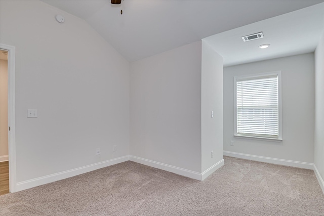 359 Sumac Trl, Evans, GA 30809 - empty room featuring light colored carpet, baseboards, lofted ceiling, a ceiling fan, and a smoke detector