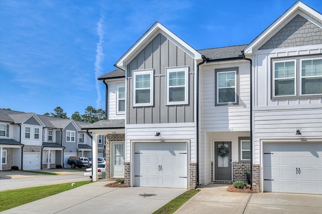 359 Sumac Trl, Evans, GA 30809 - multi unit property with board and batten siding, concrete driveway, stone siding, and a garage