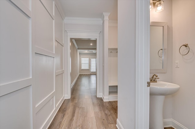 359 Sumac Trl, Evans, GA 30809 - hallway with wood finished floors, crown molding, and baseboards
