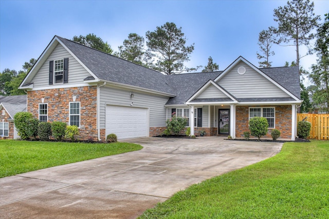 4804 High Meadows Dr, Grovetown, GA 30813 - traditional-style house with stone siding, concrete driveway, a shingled roof, an attached garage, and covered porch