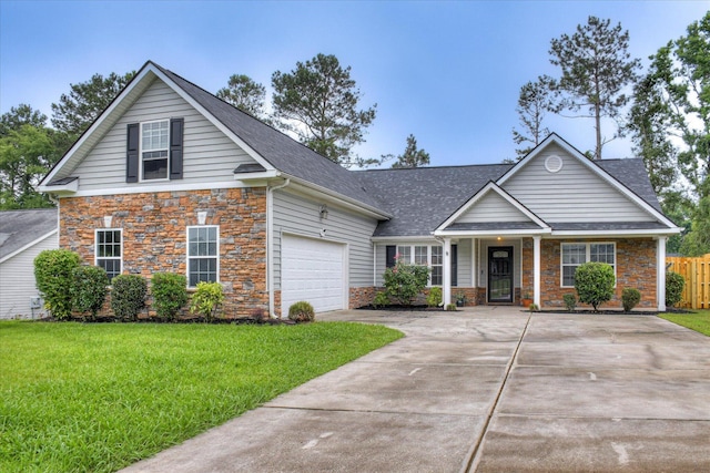 4804 High Meadows Dr, Grovetown, GA 30813 - traditional-style home with stone siding, concrete driveway, a shingled roof, and an attached garage