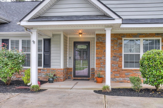 4804 High Meadows Dr, Grovetown, GA 30813 - property entrance with stone siding, covered porch, and roof with shingles
