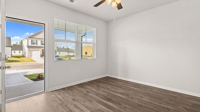 unfurnished room with ceiling fan and wood-type flooring