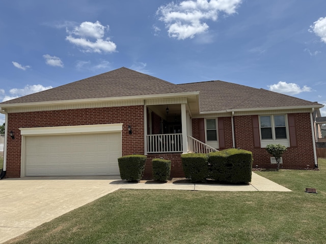 ranch-style house with brick siding, a front yard, driveway, and roof with shingles