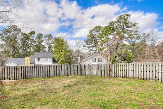 view of yard featuring a fenced backyard