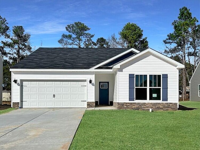 ranch-style home featuring an attached garage, a front lawn, and concrete driveway