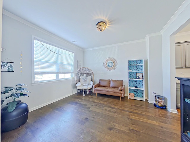 living area featuring dark hardwood / wood-style flooring and crown molding