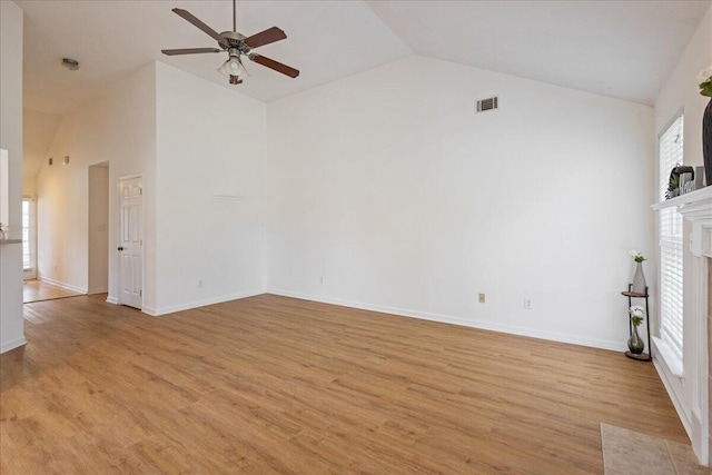 2071 Lake Forest Dr, Grovetown, GA 30813 - unfurnished living room featuring high vaulted ceiling, a ceiling fan, light wood-style flooring, and a fireplace with flush hearth