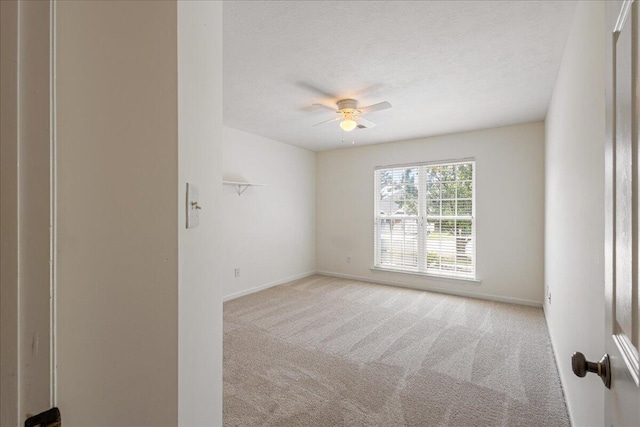 2071 Lake Forest Dr, Grovetown, GA 30813 - unfurnished room featuring a ceiling fan, light colored carpet, and a textured ceiling