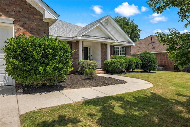 2071 Lake Forest Dr, Grovetown, GA 30813 - view of front of home featuring brick siding, a front lawn, and roof with shingles