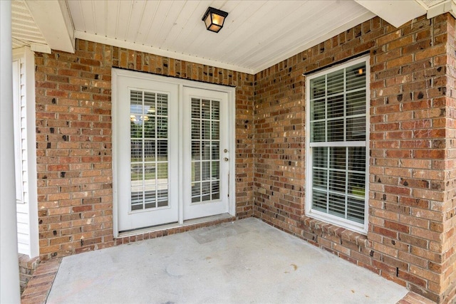 2071 Lake Forest Dr, Grovetown, GA 30813 - doorway to property featuring brick siding and a patio area