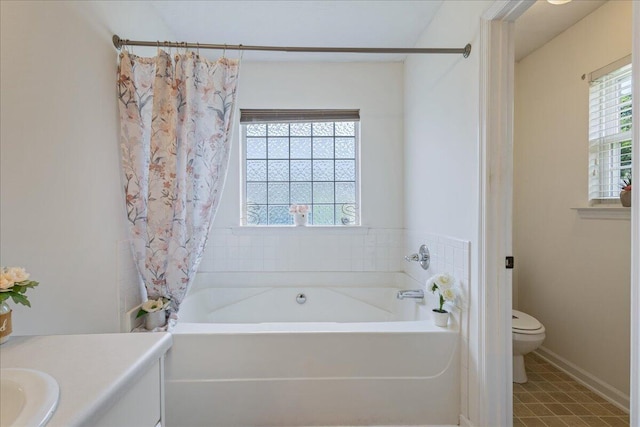 2071 Lake Forest Dr, Grovetown, GA 30813 - full bathroom featuring a garden tub, vanity, and curtained shower