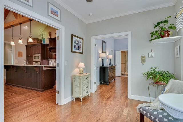 203 Jacque Cir, Mccormick, SC 29835 - sitting room with light wood-style floors, baseboards, and crown molding