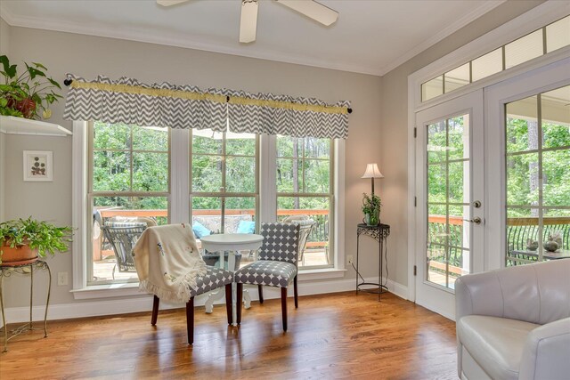 203 Jacque Cir, Mccormick, SC 29835 - sitting room with crown molding, plenty of natural light, wood finished floors, and baseboards